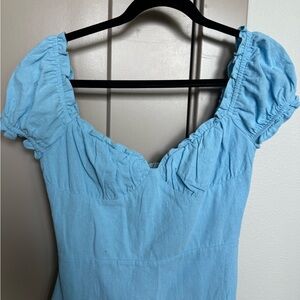 Aria ruffle mini dress in blue from Revolve